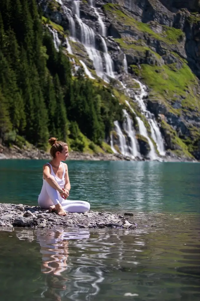 A,Woman,Practices,Yoga,In,The,Mountains,In,Switzerland,On